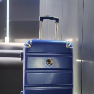 Medium size Blue travel suitcase with wheels trolley luggage bag