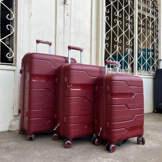 Nouveau maroon rubber fibre travel suitcase Executive trolley bag